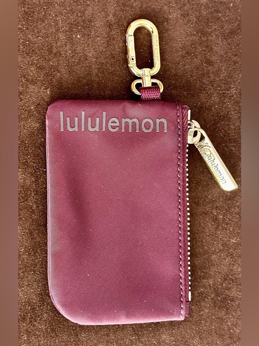 lululemon athletica plum key clip pouch with gold hardware unisex bag
